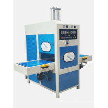 Sliding table high frequency welding and embossing machine